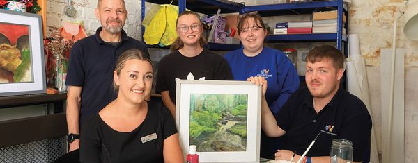 Housebuilder shares donation with Walton Lea Partnership - Warrington Chamber of Commerce